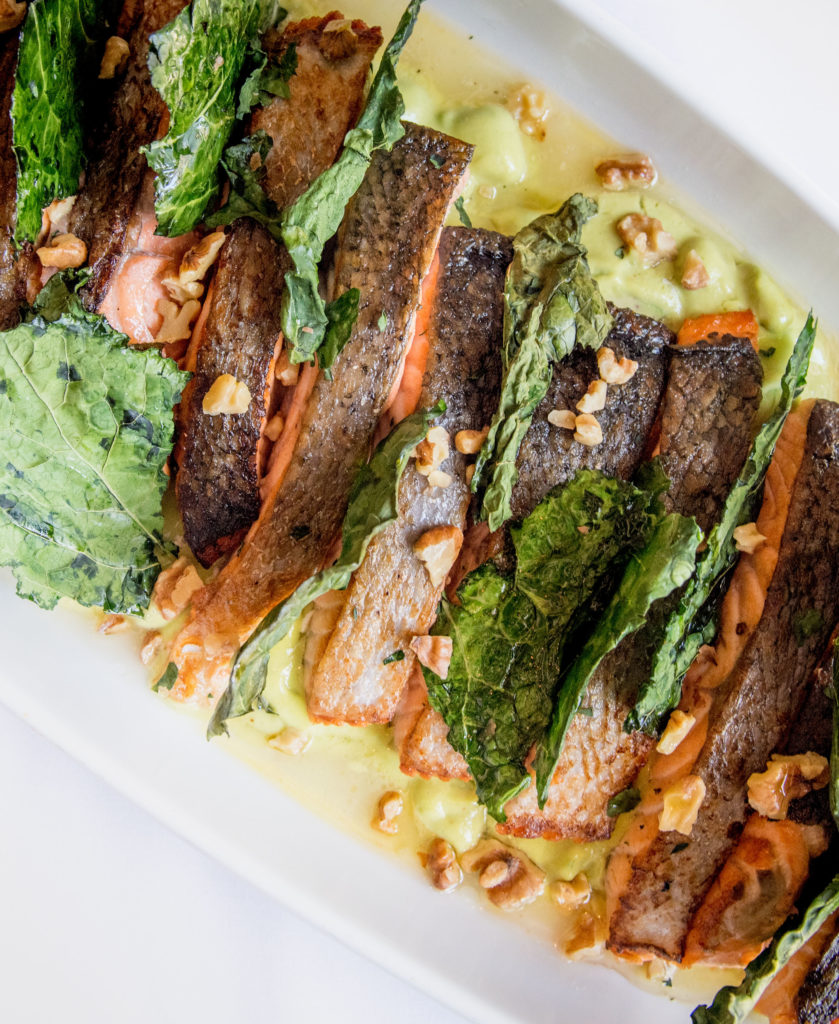 Salmon with Kale Chips, Avocado Vinaigrette and Toasted Walnuts